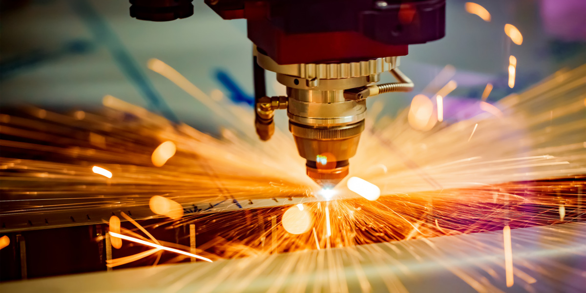 CNC Laser cutting of metal, modern industrial technology.