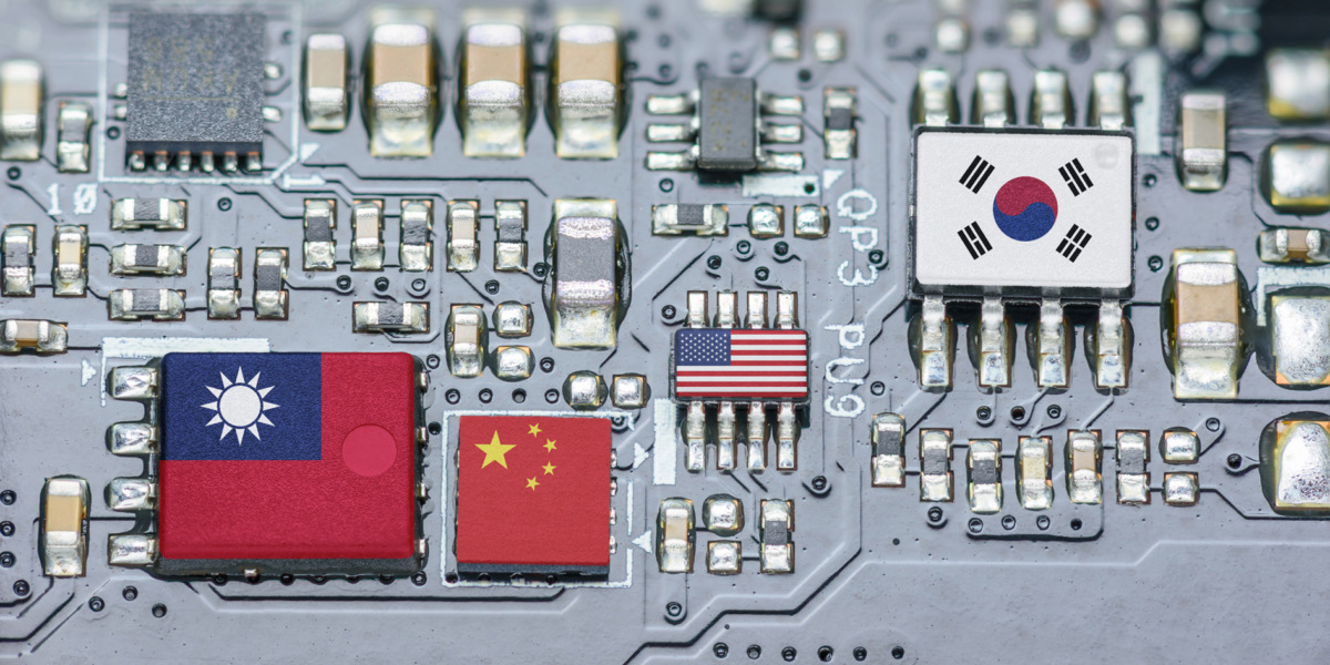 Flag of the Republic of China or Taiwan, China, Korea and USA on a processor, CPU or GPU microchip on a motherboard. Taiwan manufacturing chip industry emerges as battlefront in U.S. - China showdown.